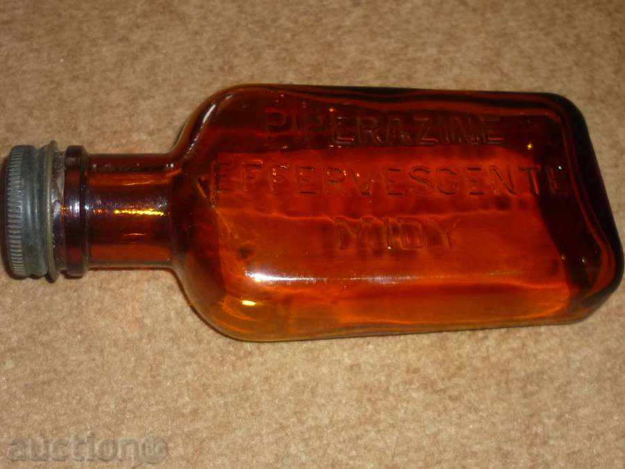 Auction An anti-medication bottle for medicinal syrups Auction An anti-medication bottle for medicinal syrups