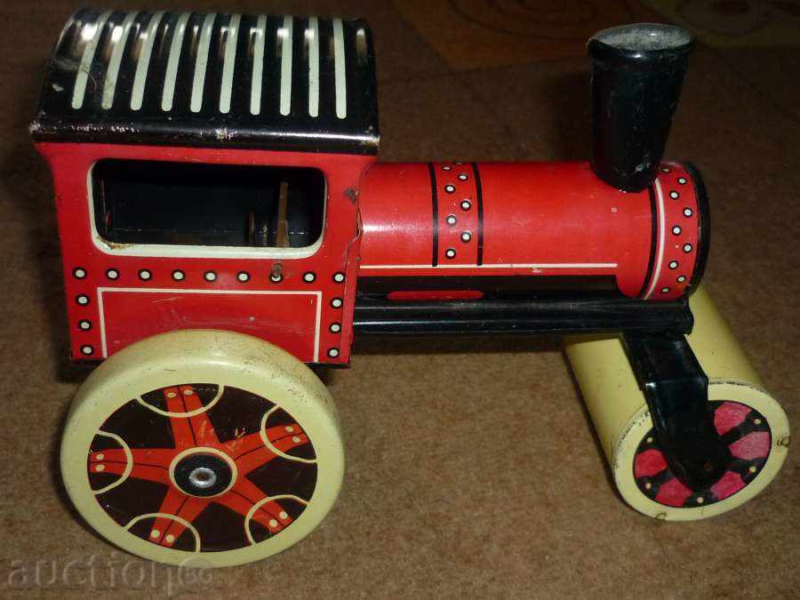 Auction Vintage tin toy with winding mechanism Auction Vintage tin toy with winding mechanism