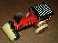 Vintage tin toy with winding mechanism