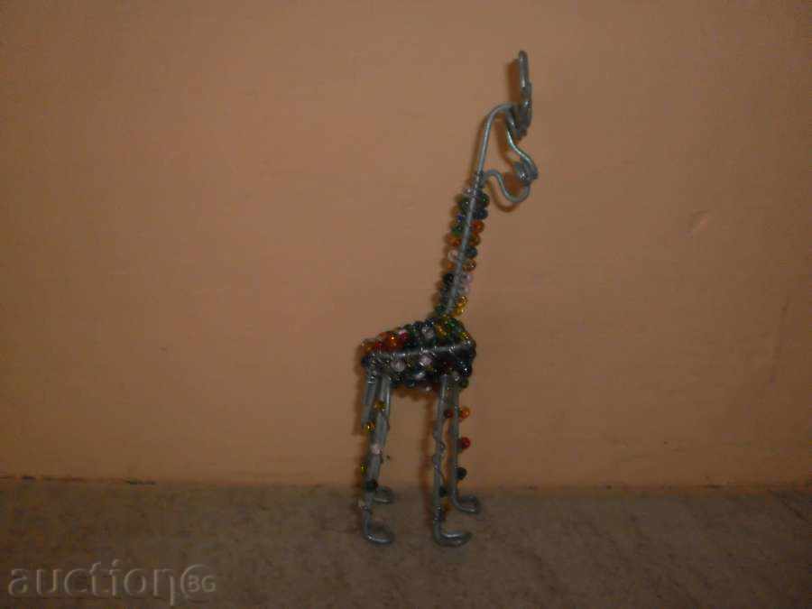 Giraffe - a small figure of wire and sand beads with price 19.00 BGN | € 9.71 Giraffe - a small figure of wire and sand beads with price 19.00 BGN | € 9.71