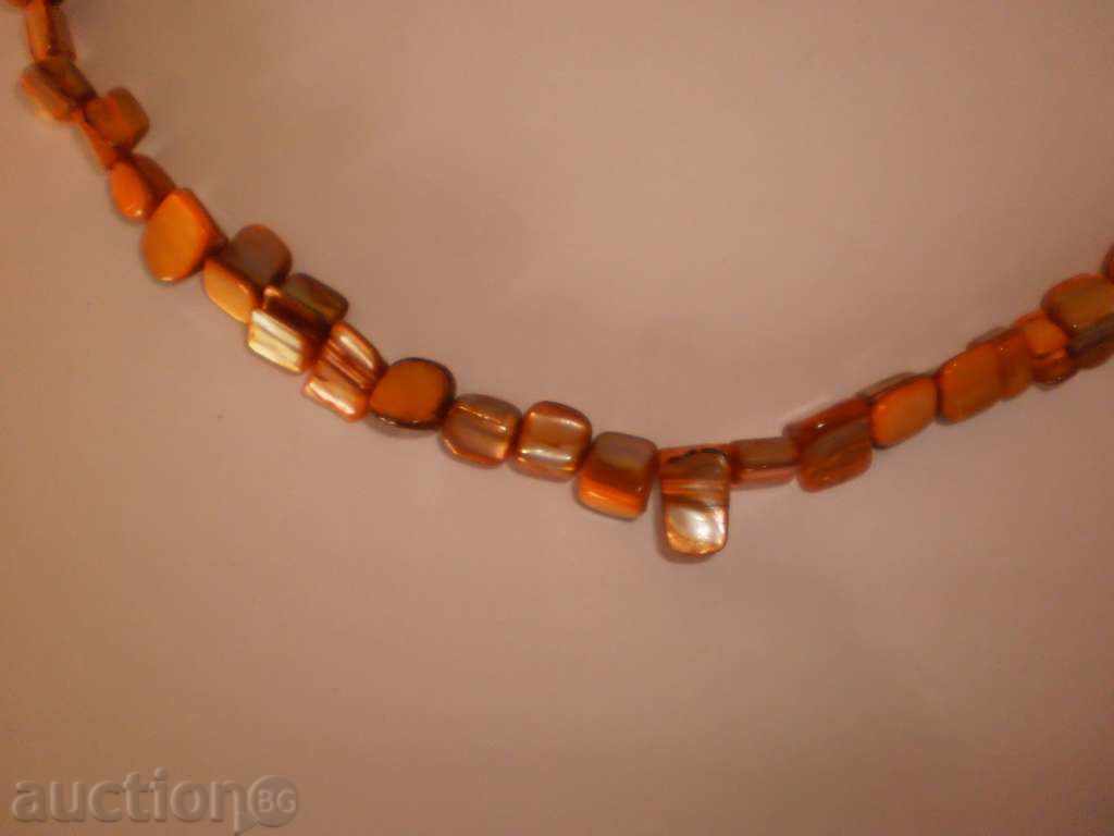 Auction Geradan from mother of pearl in brown Auction Geradan from mother of pearl in brown