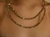 Necklace of glass beads - old gold