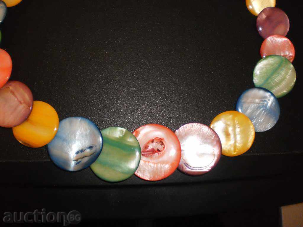 Delivery of Necklace made of natural multicolored mother of pearl in round shape Delivery of Necklace made of natural multicolored mother of pearl in round shape