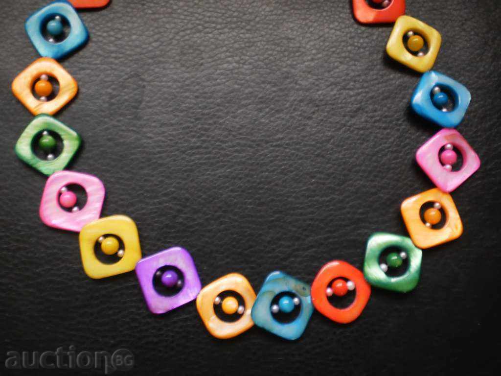 A necklace of natural multi-colored mother-of-pearl with a quadrangular shape with price 32.00 BGN | € 16.36 A necklace of natural multi-colored mother-of-pearl with a quadrangular shape with price 32.00 BGN | € 16.36