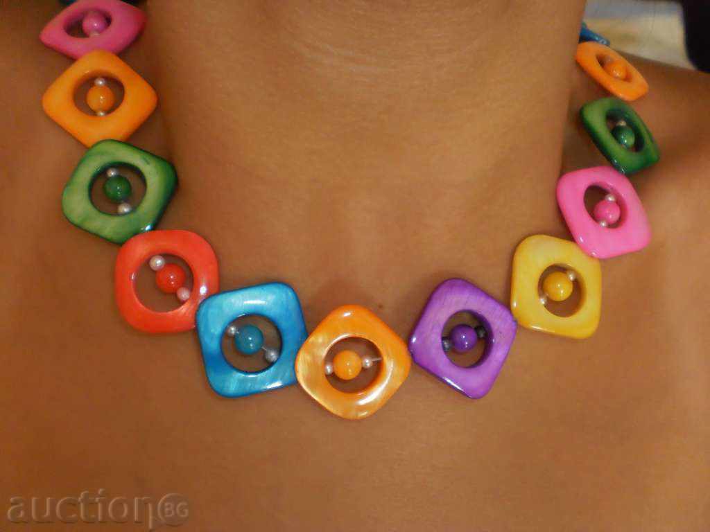 Delivery of A necklace of natural multi-colored mother-of-pearl with a quadrangular shape Delivery of A necklace of natural multi-colored mother-of-pearl with a quadrangular shape