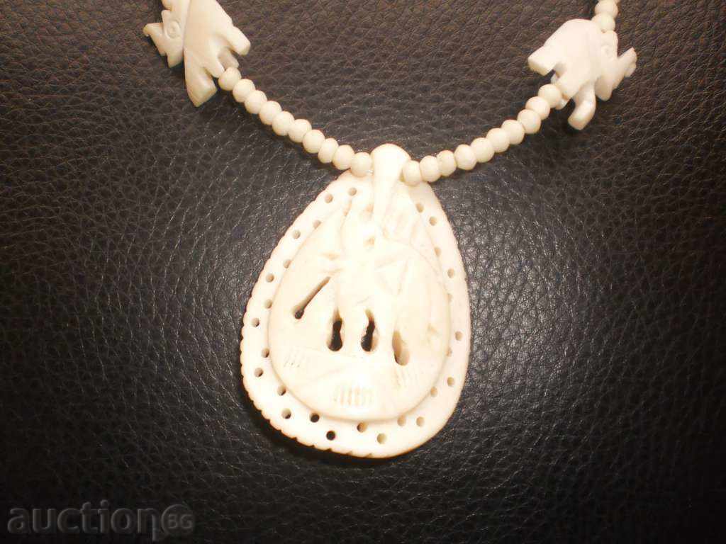 Auction Necklace with camel bone with elephants Auction Necklace with camel bone with elephants