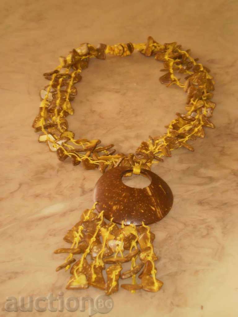 Exotic coconut-yellow necklace with price 25.00 BGN | € 12.78 Exotic coconut-yellow necklace with price 25.00 BGN | € 12.78