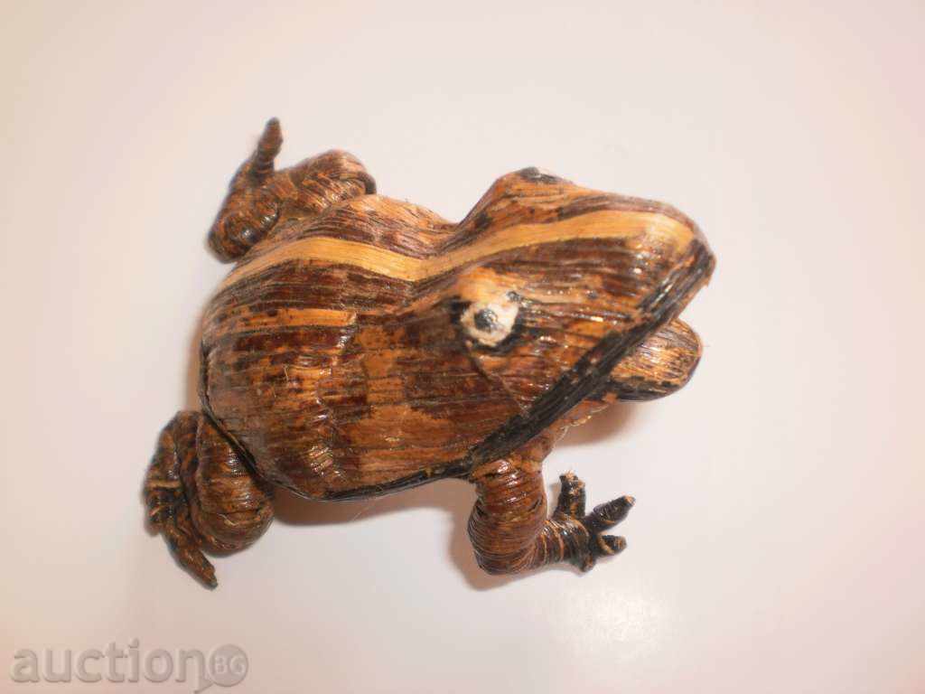 Delivery of Frog-figure from a banana leaf Delivery of Frog-figure from a banana leaf