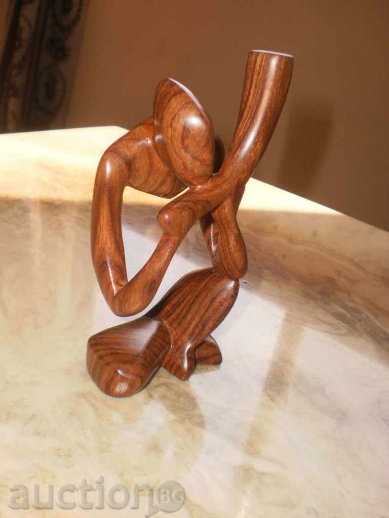 A musician with a horn-stylized figure of the exotic wood Sessa with price 88.00 BGN | € 44.99 A musician with a horn-stylized figure of the exotic wood Sessa with price 88.00 BGN | € 44.99