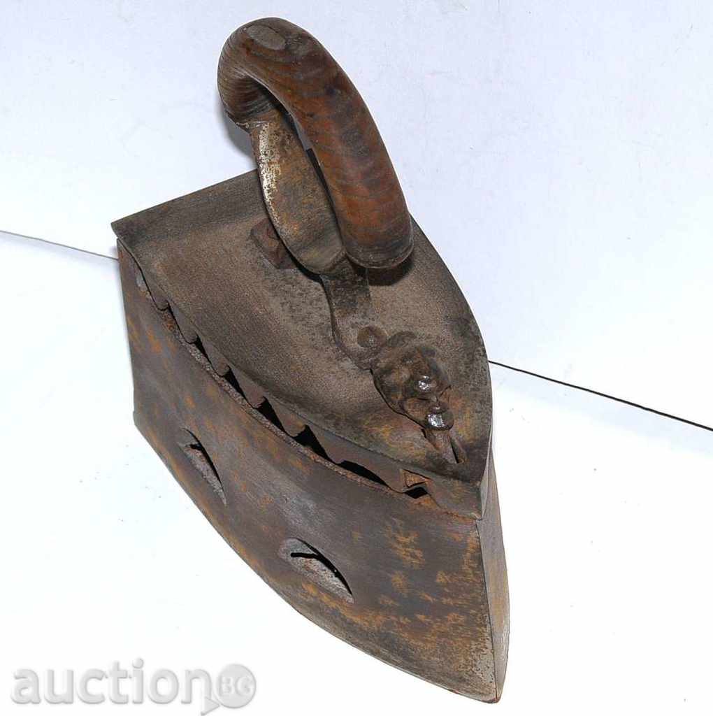 Auction  Iron on fire with internal grill
