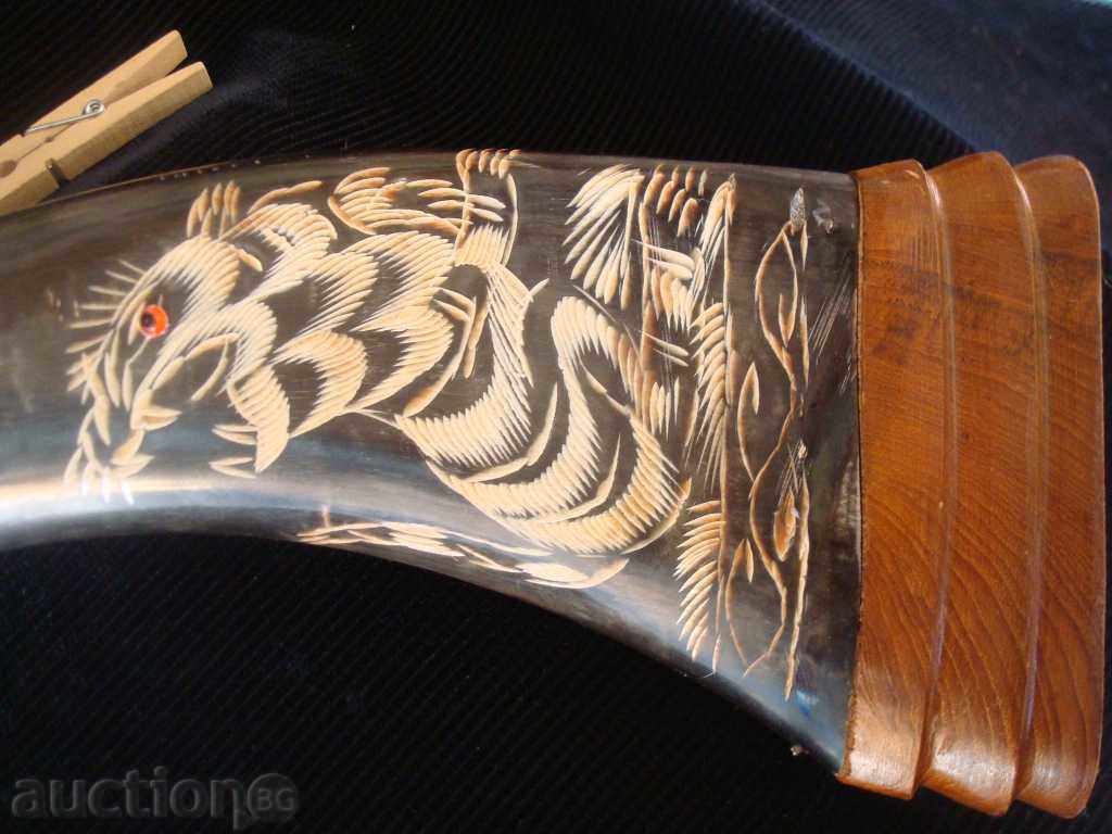 Buffalo horn, carved with a tiger and a dragon on a wooden stand with price € 45.96 | 89.89 BGN