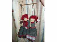 dolls on swing