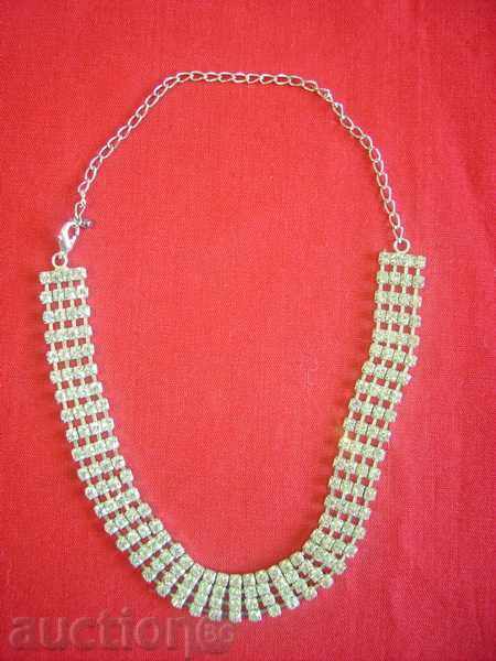 I sell a necklace with white stones