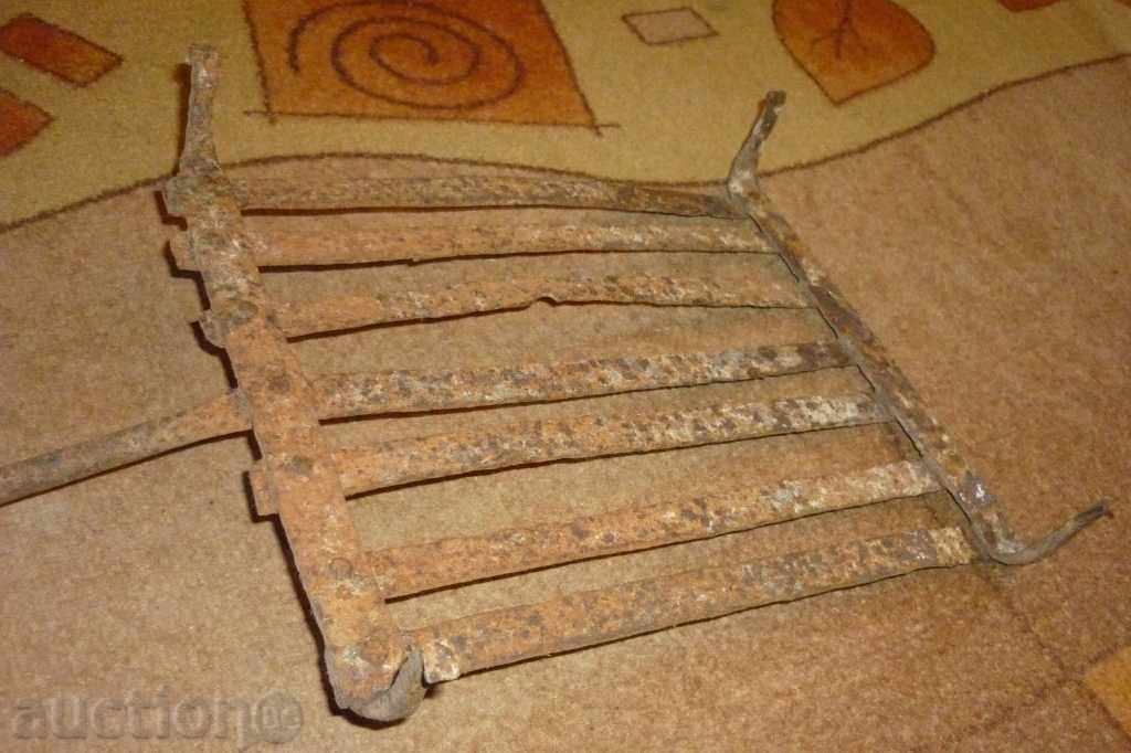 Delivery of An old forged grill, shish, cheverme, shashlik Delivery of An old forged grill, shish, cheverme, shashlik