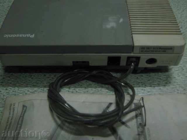 Auction Secretary with a small cassette phone Auction Secretary with a small cassette phone