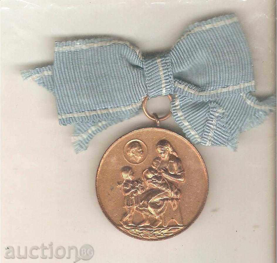 Medal "For Maternity" first degree with tape