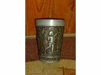 An old metallic cup, stack, goblet, mug