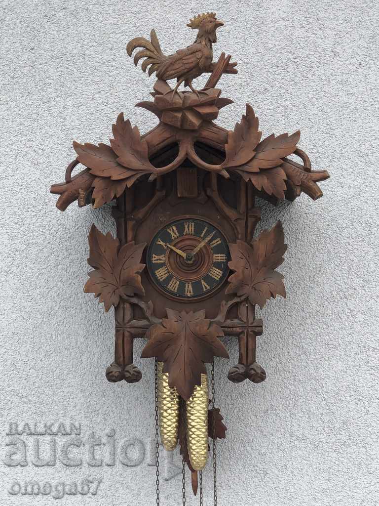 Wall clock with Black Forest cuckoo from 1900