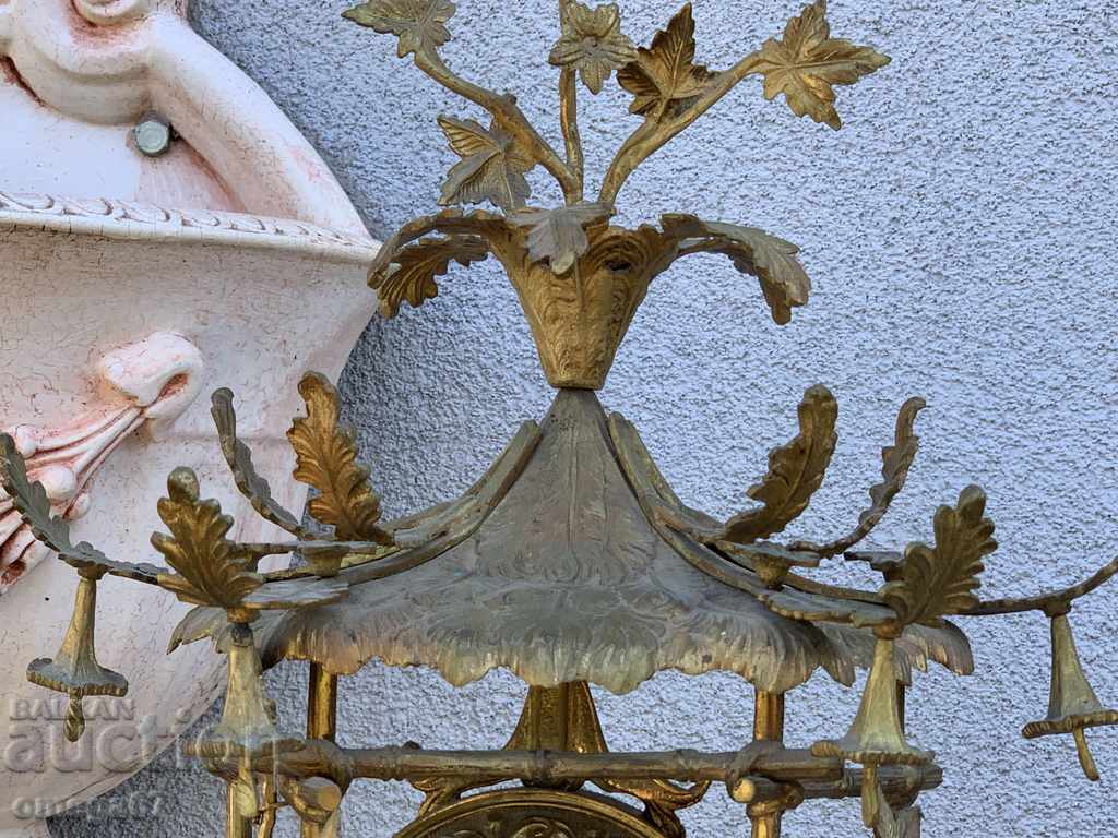 Auction  Fireplace clock from the middle of the 20th century.