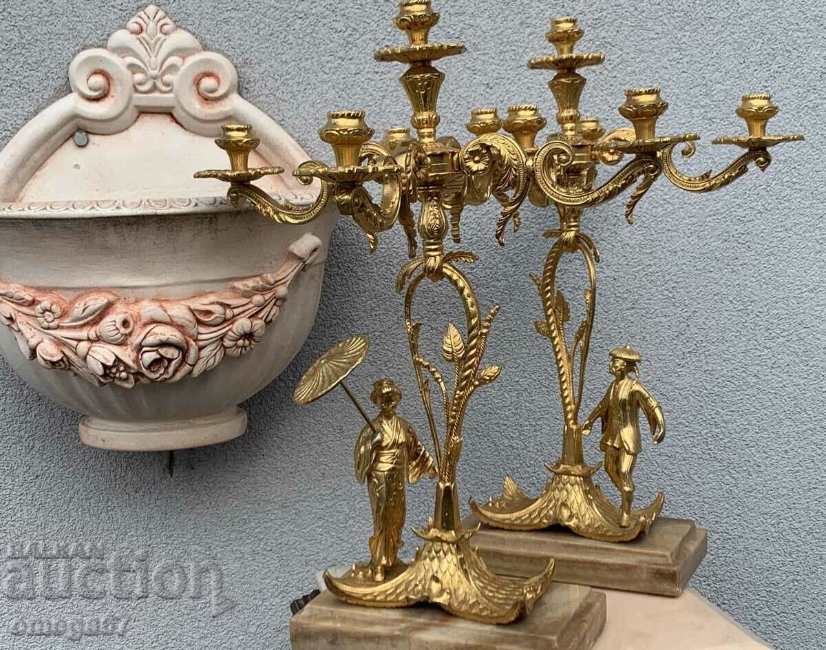 A pair of large, elegant bronze candlesticks with gilding - 20th century.