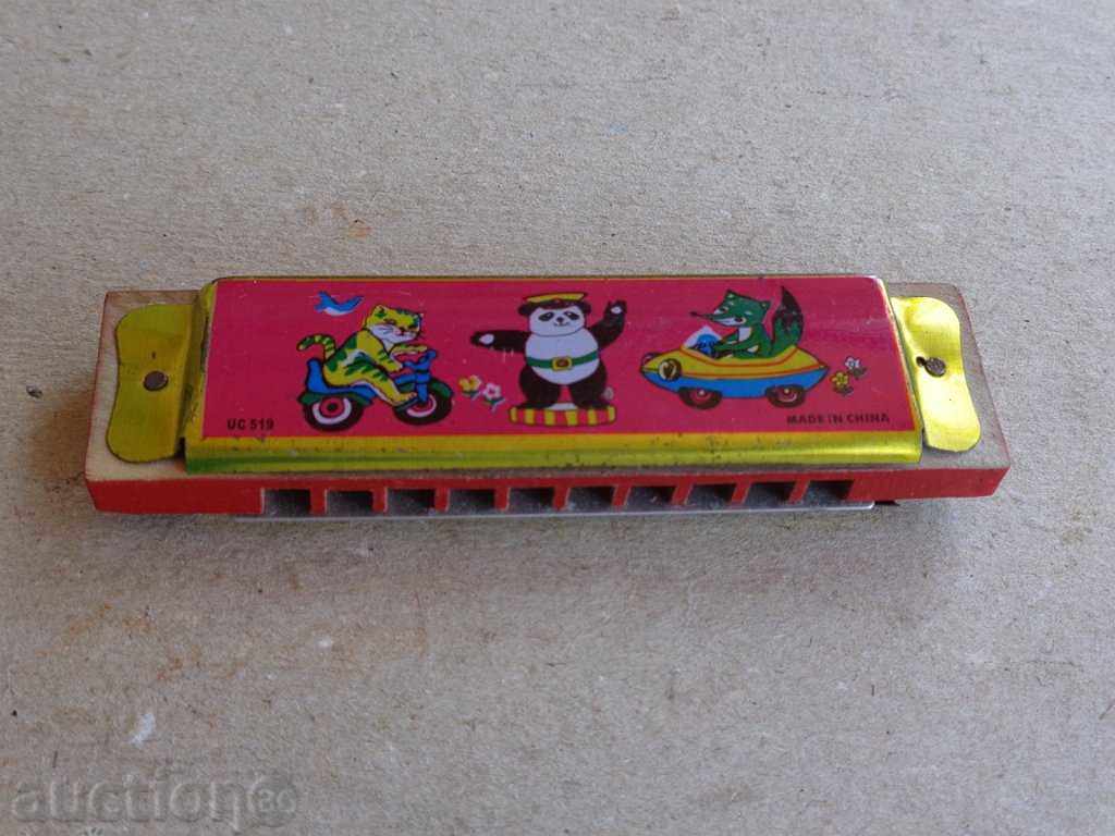 Children's harmonica, musical instrument with price 10.00 BGN | € 5.11 Children's harmonica, musical instrument with price 10.00 BGN | € 5.11