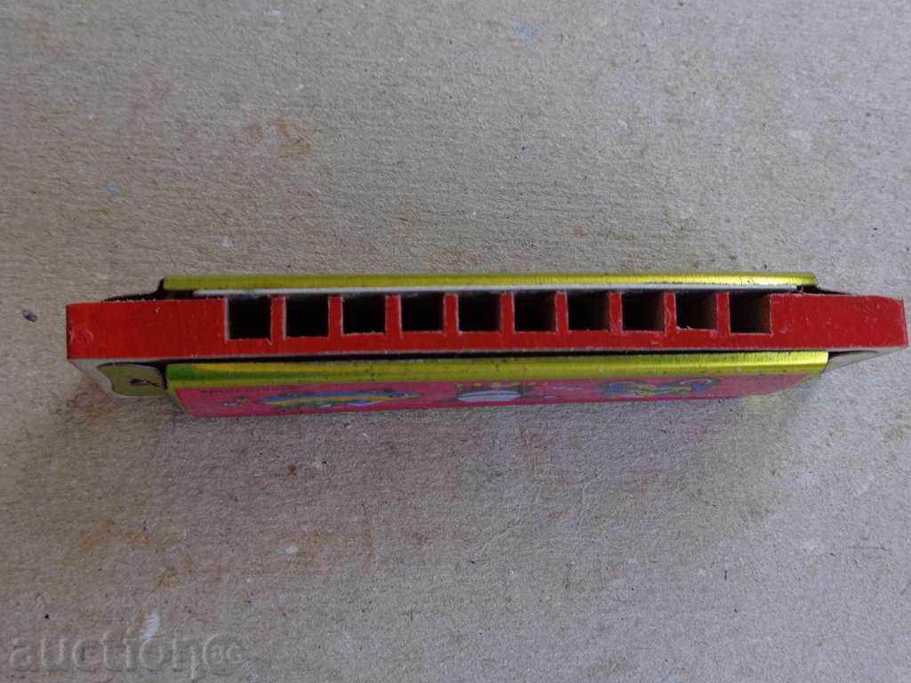 Auction Children's harmonica, musical instrument Auction Children's harmonica, musical instrument