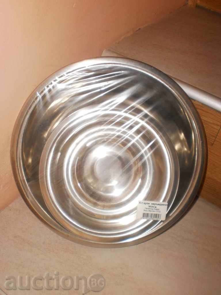 Auction A new set of two stainless steel bowls Auction A new set of two stainless steel bowls