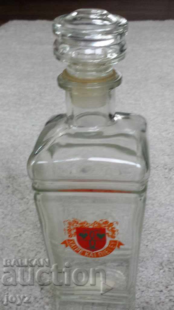 An ancient Greek glass bottle for alcohol