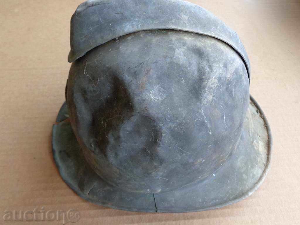 Delivery of Brass fire helmet