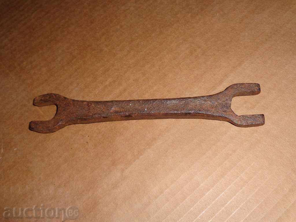 Delivery of An old wrought iron key from a wrought iron workshop Delivery of An old wrought iron key from a wrought iron workshop