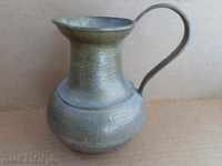 Old bronze jug, teapot, hibiscus, chum