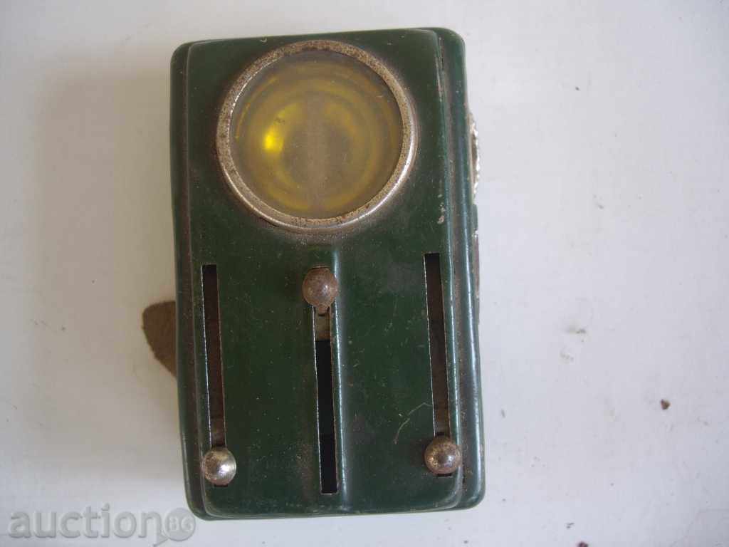 An old torch with colored glasses with price 8.00 BGN | € 4.09 An old torch with colored glasses with price 8.00 BGN | € 4.09