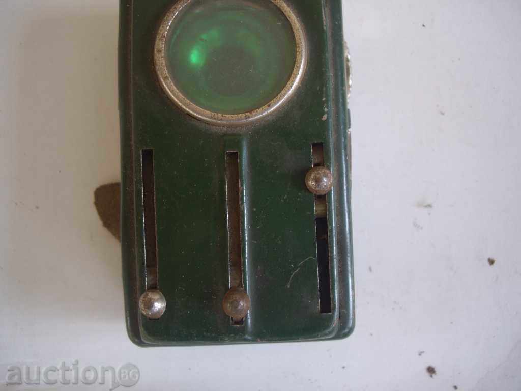 Auction An old torch with colored glasses Auction An old torch with colored glasses