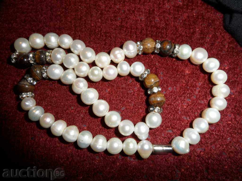 NECK Natural pearls and tiger eye with price 169.99 BGN | € 86.91 NECK Natural pearls and tiger eye with price 169.99 BGN | € 86.91