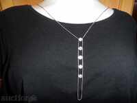 WHITE WITH 5 stones on the pendant