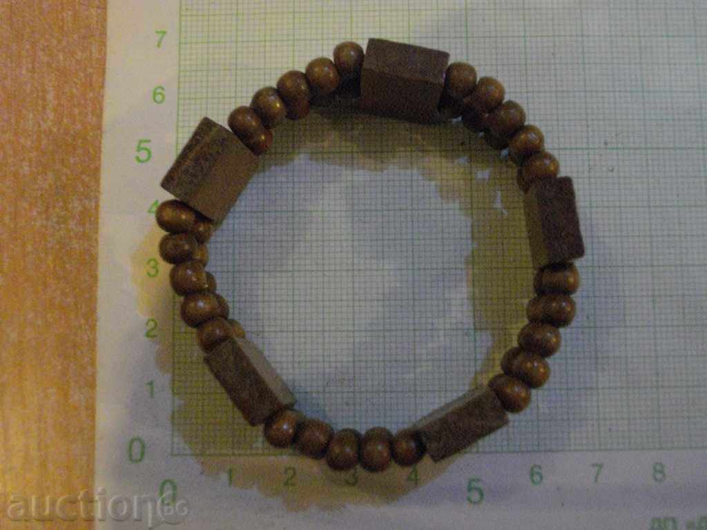 Chain of wooden details with price 3.00 BGN | € 1.53 Chain of wooden details with price 3.00 BGN | € 1.53