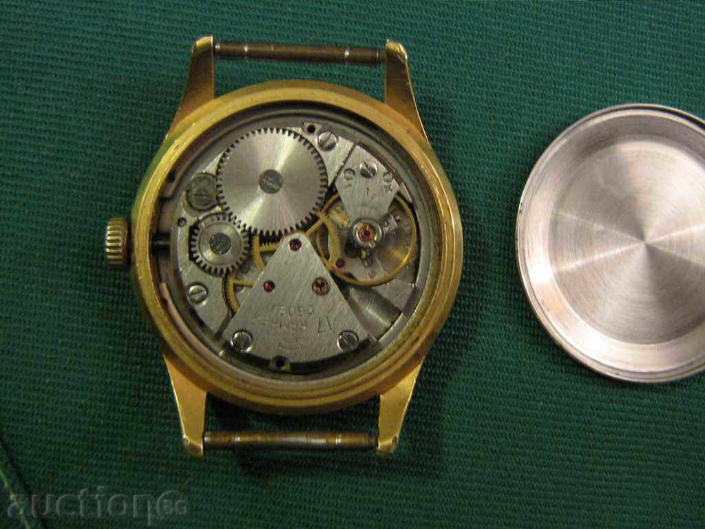 Auction  RED MECHANICAL CLOCKWORK