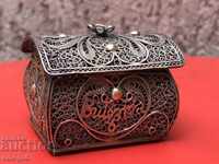 Silver filigree canister with rose oil ampoule