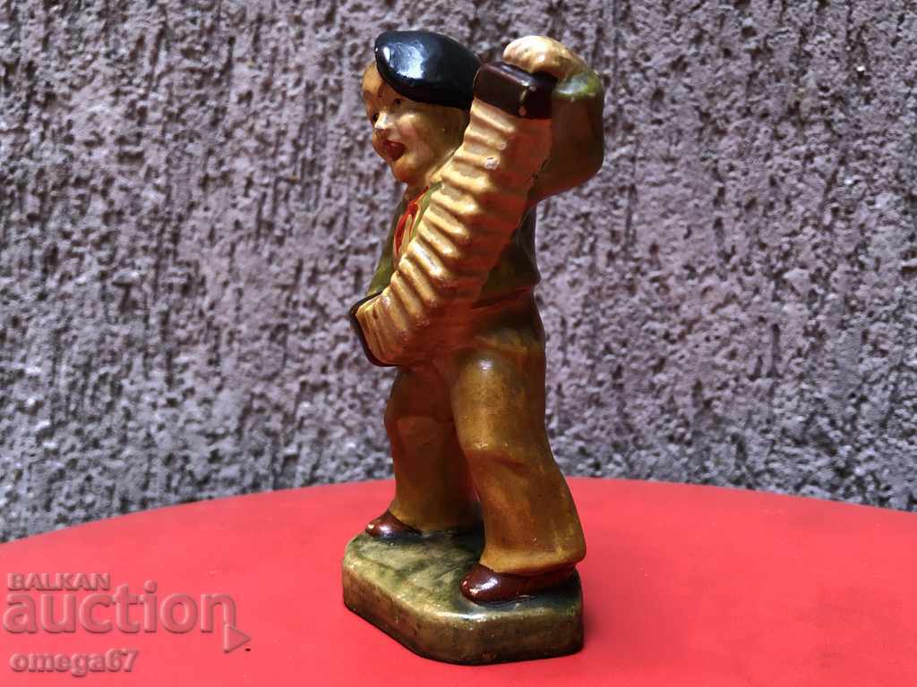 Αρχαίο κεραμικό ειδώλιο "Ο μικρός ακορντεονίστας" με τιμή € 45.00 | 88.01 BGN Αρχαίο κεραμικό ειδώλιο "Ο μικρός ακορντεονίστας" με τιμή € 45.00 | 88.01 BGN