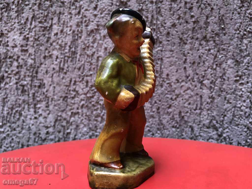 Δημοπρασία Αρχαίο κεραμικό ειδώλιο "Ο μικρός ακορντεονίστας" Δημοπρασία Αρχαίο κεραμικό ειδώλιο "Ο μικρός ακορντεονίστας"