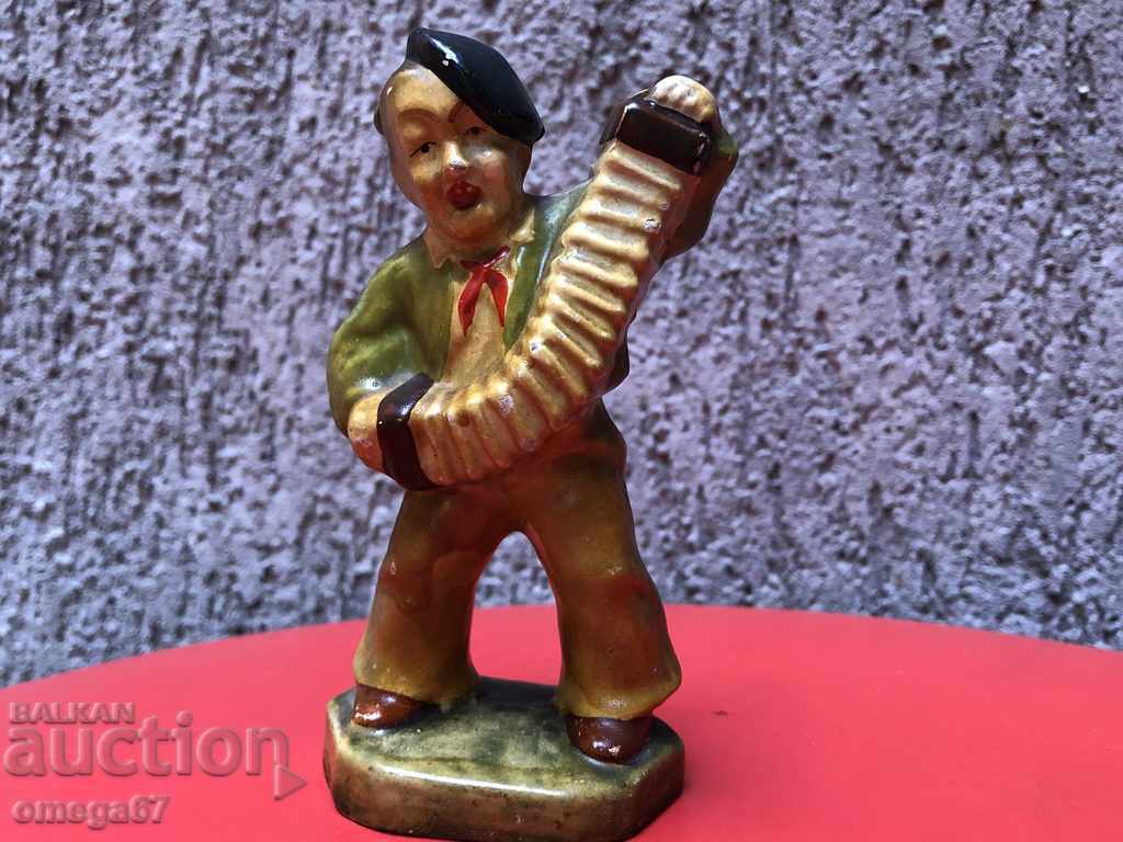 Αρχαίο κεραμικό ειδώλιο "Ο μικρός ακορντεονίστας" Αρχαίο κεραμικό ειδώλιο "Ο μικρός ακορντεονίστας"