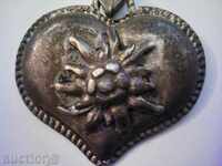 Old thick silver heart