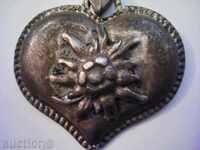 Old thick silver heart