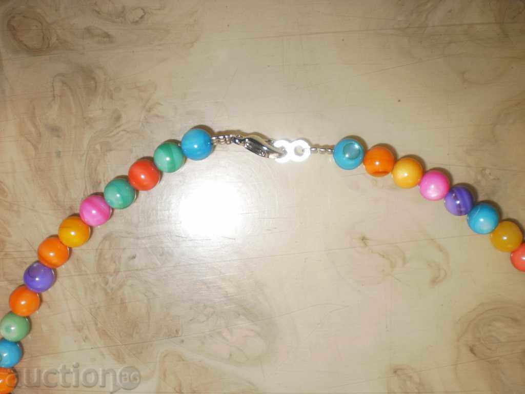 Necklace of natural multi-colored mother-of-pearl with a round shape with price 15.00 BGN | € 7.67 Necklace of natural multi-colored mother-of-pearl with a round shape with price 15.00 BGN | € 7.67