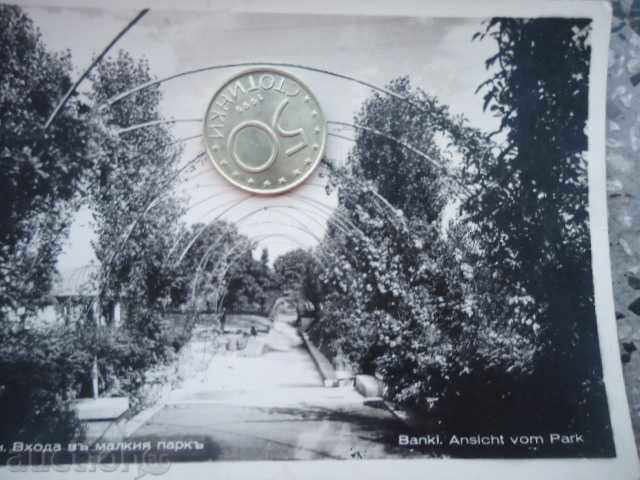 Delivery of Bank Cards. The entrance to the small park