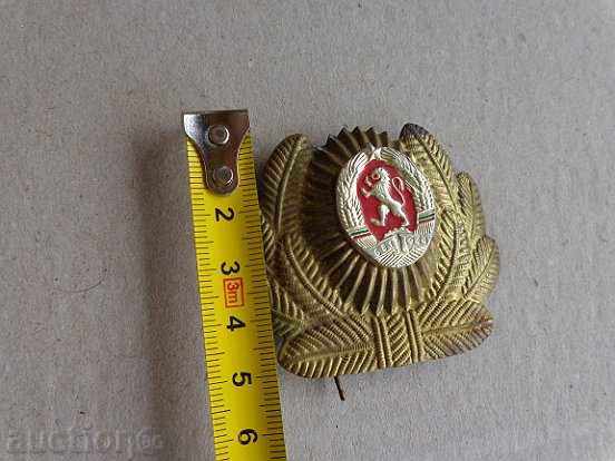 Auction Sock cocard from a uniform Auction Sock cocard from a uniform