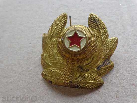 Auction Sock cocard from a uniform Auction Sock cocard from a uniform