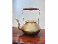 Old bronze teapot with lid