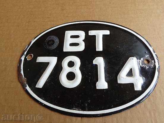 Enamelled license plate for a motorcycle, motorbike