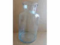An old hand-blown jar, a bottle, a tamarind, glass